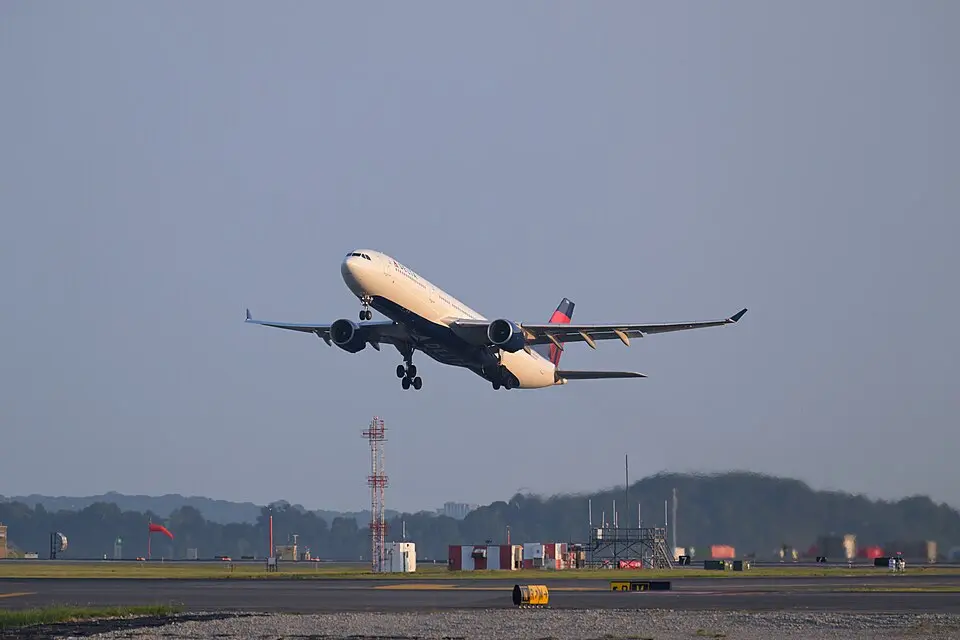 Delta Air Lines Airbus A330 climbing out shortly after takeoff